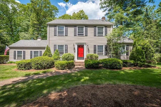 3 Tally Ho Dr, Hamilton, MA 01982 - colonial inspired home featuring a chimney and a front yard