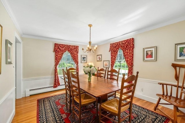 3 Tally Ho Dr, Hamilton, MA 01982 - dining area with baseboard heating, a chandelier, light wood-style flooring, and crown molding
