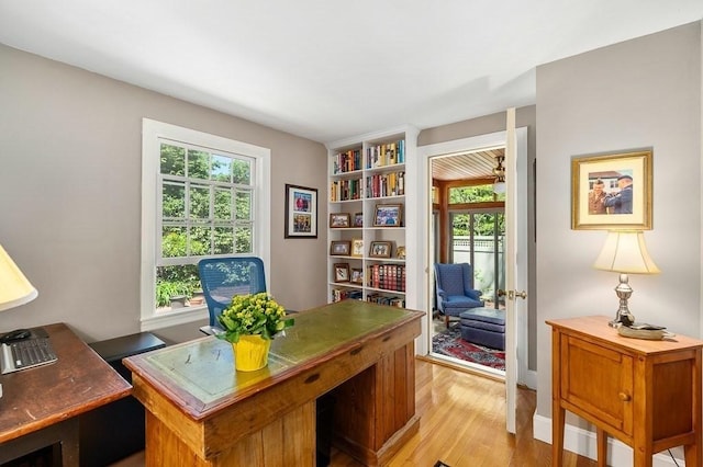 3 Tally Ho Dr, Hamilton, MA 01982 - home office featuring healthy amount of natural light and light wood-style flooring