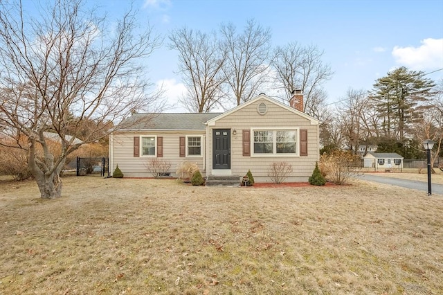 view of front of house with a front lawn