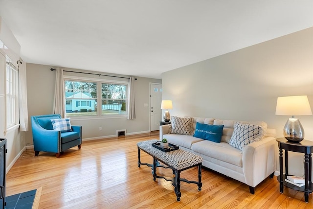 living room with light wood-type flooring