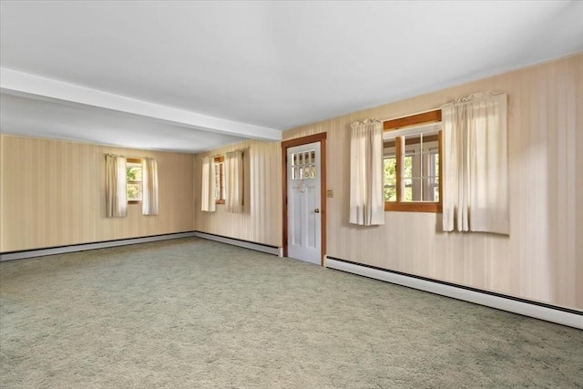 unfurnished room featuring carpet flooring, beam ceiling, a baseboard heating unit, and a baseboard radiator