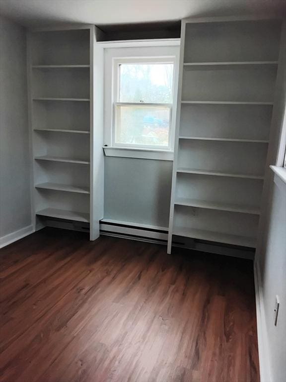 closet featuring a baseboard radiator