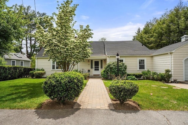39 Manton Rd, Swampscott, MA 01907 - view of front of home with a front lawn and roof with shingles