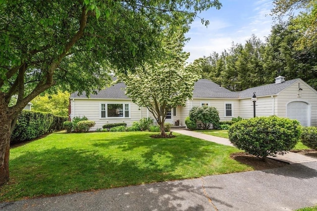 39 Manton Rd, Swampscott, MA 01907 - view of front of property with a front lawn, a garage, and a shingled roof