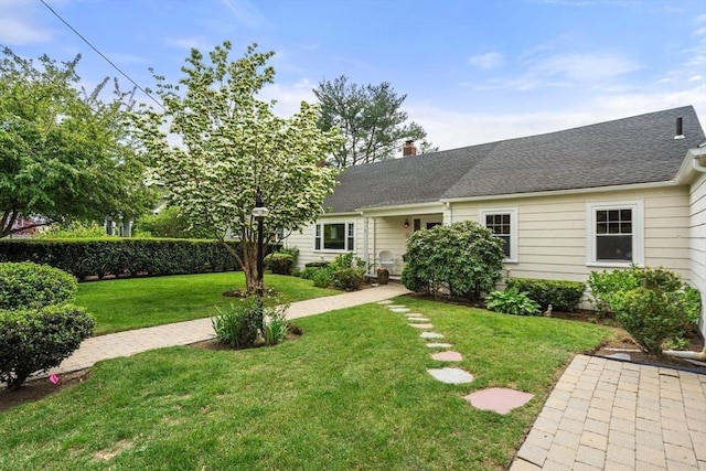39 Manton Rd, Swampscott, MA 01907 - view of front of property featuring a front lawn, a chimney, and a shingled roof