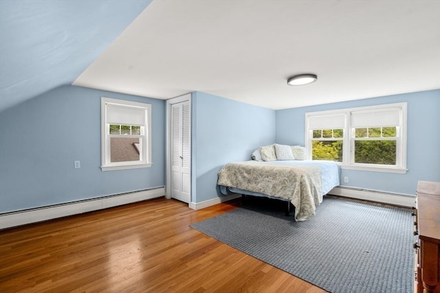 39 Manton Rd, Swampscott, MA 01907 - bedroom featuring a baseboard radiator, wood finished floors, and a closet