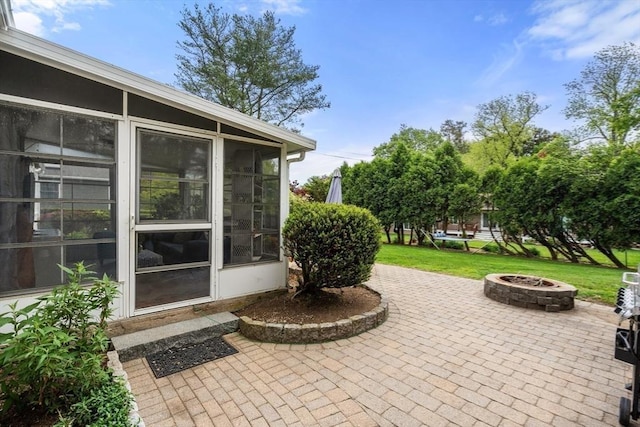 39 Manton Rd, Swampscott, MA 01907 - view of patio / terrace featuring a fire pit and a sunroom
