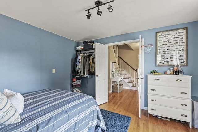 188 Munger Hill Rd, Westfield, MA 01085 - bedroom with light wood-style flooring, a closet, and baseboards