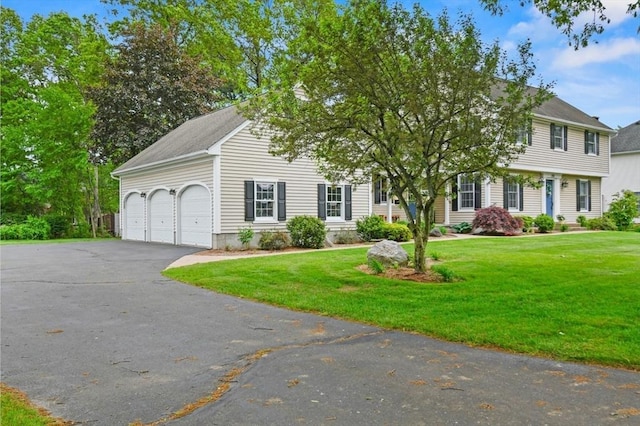188 Munger Hill Rd, Westfield, MA 01085 - view of front of home with asphalt driveway, an attached garage, and a front yard