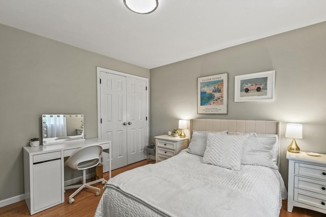 188 Munger Hill Rd, Westfield, MA 01085 - bedroom featuring wood finished floors, a closet, an office area, and baseboards