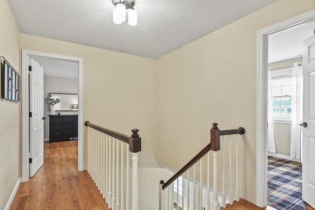 188 Munger Hill Rd, Westfield, MA 01085 - hallway with an upstairs landing, wood finished floors, and baseboards