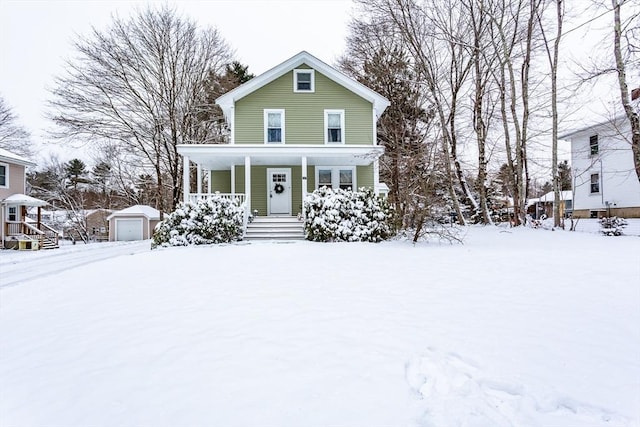 view of front property featuring an outdoor structure and covered porch