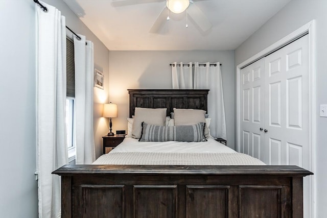 bedroom featuring ceiling fan and a closet