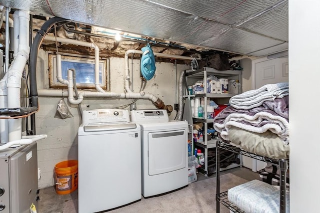 washroom with independent washer and dryer