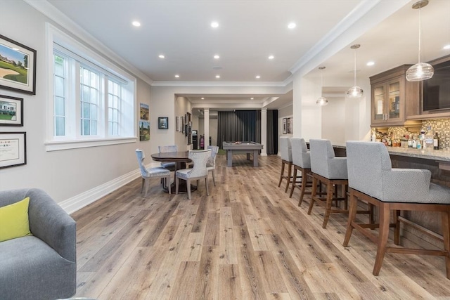 8 Hidden Rd, Weston, MA 02493 - dining space with crown molding, a dry bar, light wood-style floors, recessed lighting, and baseboards