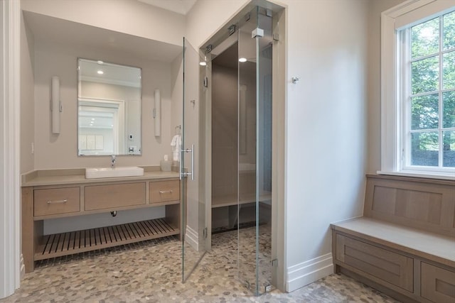 8 Hidden Rd, Weston, MA 02493 - bathroom featuring vanity, healthy amount of natural light, baseboards, a shower, and recessed lighting
