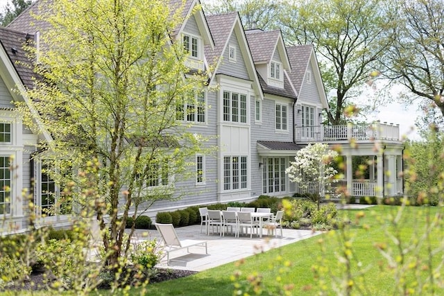 8 Hidden Rd, Weston, MA 02493 - back of house with a patio area, a yard, and a balcony