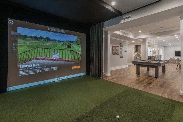 8 Hidden Rd, Weston, MA 02493 - playroom with crown molding, wood finished floors, billiards, baseboards, and golf simulator