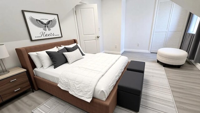 bedroom with light wood-style flooring and baseboards