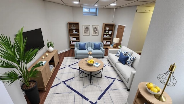 living room featuring baseboards, recessed lighting, and wood finished floors