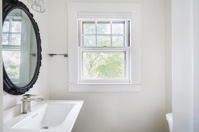 bathroom with sink and toilet