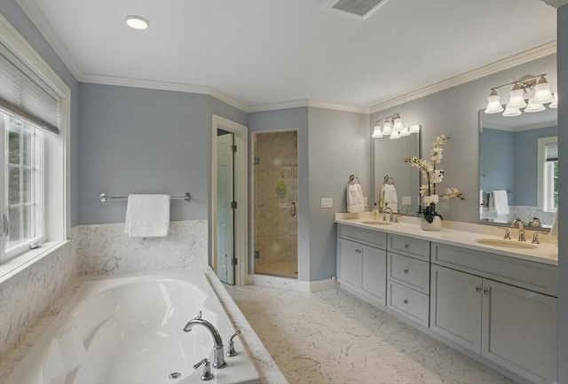 bathroom featuring double vanity, a sink, a bath, and a stall shower