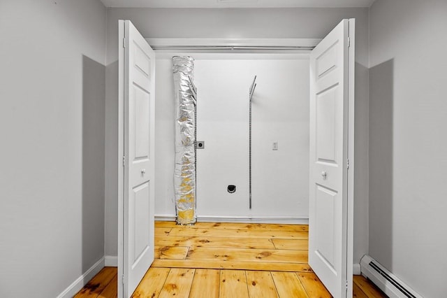 853 Oxford St S, Auburn, MA 01501 - hallway featuring a baseboard radiator and hardwood / wood-style floors