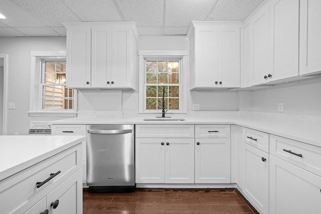 853 Oxford St S, Auburn, MA 01501 - kitchen featuring stainless steel dishwasher, a drop ceiling, white cabinetry, and light countertops