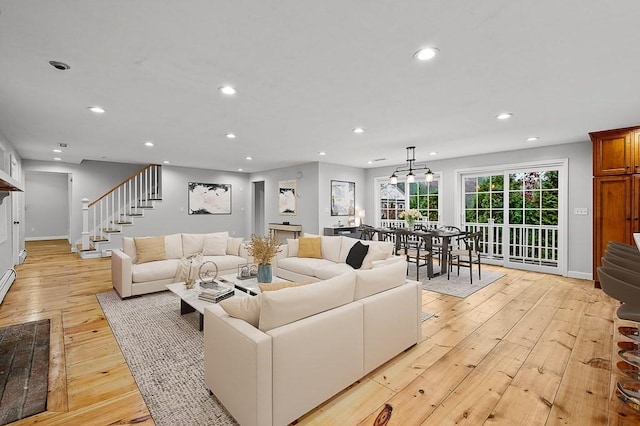 853 Oxford St S, Auburn, MA 01501 - living room with light wood-style flooring, stairs, recessed lighting, and baseboards
