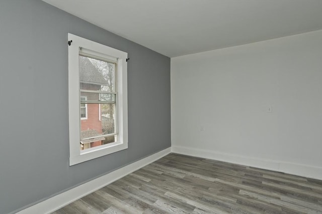 74 Everett St, Springfield, MA 01104 - spare room with baseboards and wood finished floors