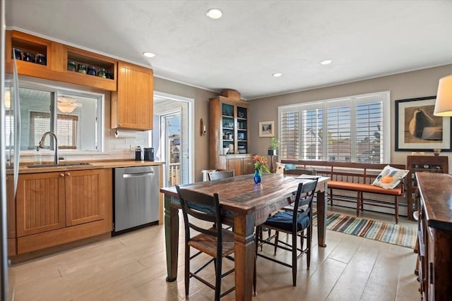 12 14th St, Newbury, MA 01951 - kitchen featuring dishwasher, a sink, light wood-style flooring, baseboard heating, and recessed lighting