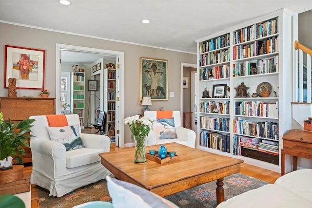 12 14th St, Newbury, MA 01951 - sitting room with wood finished floors, crown molding, and recessed lighting