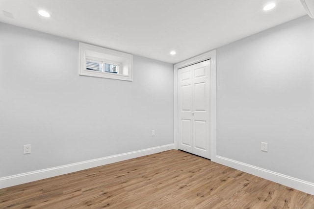 interior space with recessed lighting, light wood-type flooring, and baseboards