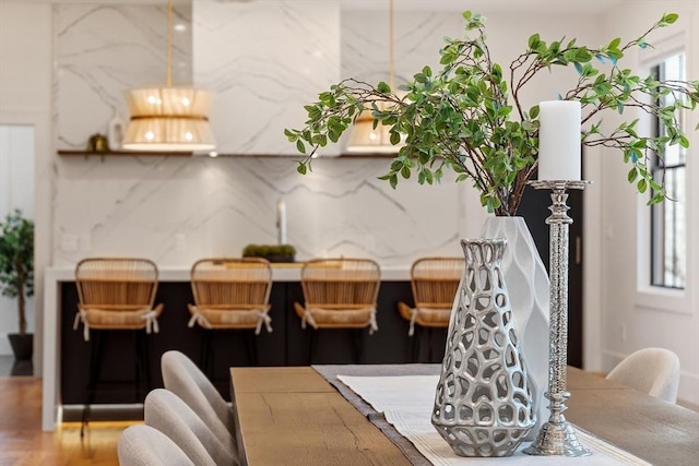 dining space featuring wood finished floors