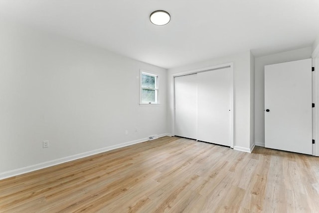 78 Saratoga Ave, Chicopee, MA 01013 - unfurnished bedroom featuring light wood-style flooring and a closet