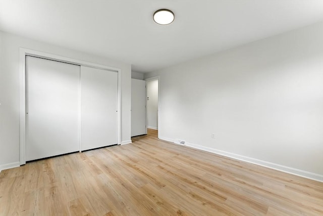 78 Saratoga Ave, Chicopee, MA 01013 - unfurnished bedroom featuring light wood-style floors and a closet