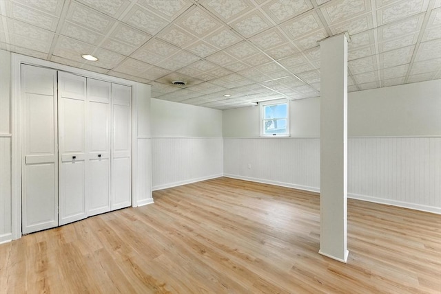 78 Saratoga Ave, Chicopee, MA 01013 - below grade area featuring light wood-type flooring and a wainscoted wall