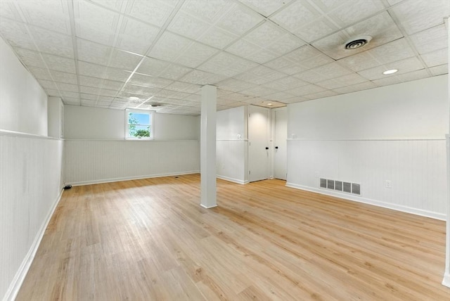 78 Saratoga Ave, Chicopee, MA 01013 - below grade area with light wood-type flooring and a wainscoted wall