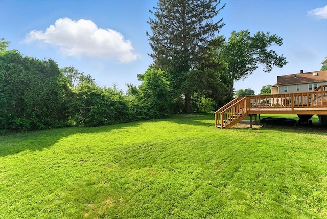 78 Saratoga Ave, Chicopee, MA 01013 - view of green lawn featuring a wooden deck and stairs