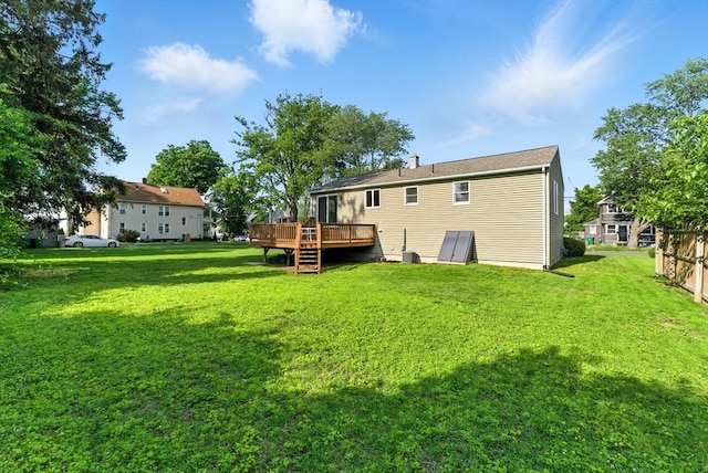 78 Saratoga Ave, Chicopee, MA 01013 - rear view of house with a deck
