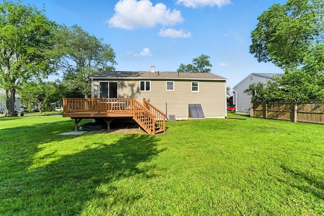78 Saratoga Ave, Chicopee, MA 01013 - rear view of house with a wooden deck