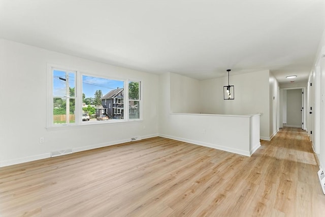 78 Saratoga Ave, Chicopee, MA 01013 - empty room featuring light wood-type flooring and baseboards