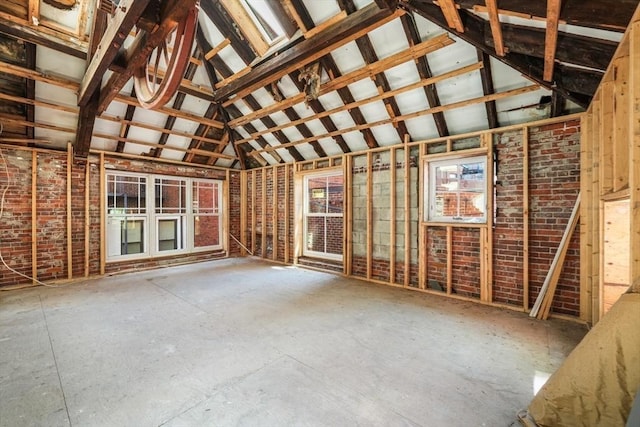 misc room with lofted ceiling