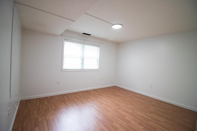 369 Aiken Ave Unit 15, Lowell, MA 01850 - spare room featuring light wood-style floors and baseboards