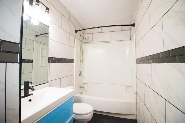 369 Aiken Ave Unit 15, Lowell, MA 01850 - full bath featuring tile walls, shower / bathtub combination, toilet, and vanity