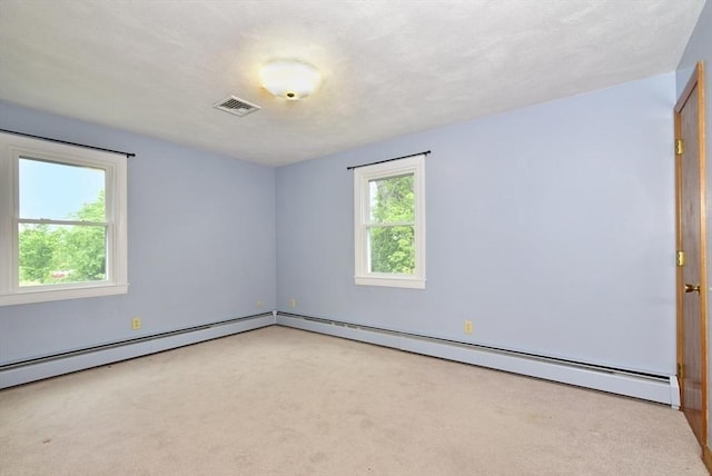 767 S Main St, Bellingham, MA 02019 - unfurnished room featuring carpet floors and a baseboard heating unit
