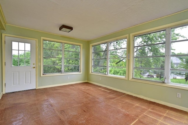767 S Main St, Bellingham, MA 02019 - unfurnished sunroom with plenty of natural light and a textured ceiling