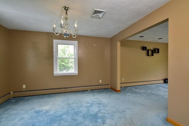 767 S Main St, Bellingham, MA 02019 - carpeted empty room with a baseboard radiator and a chandelier