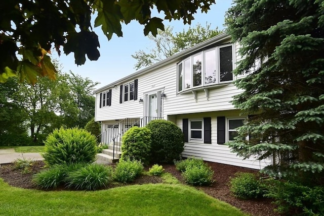 767 S Main St, Bellingham, MA 02019 - bi-level home with a front yard